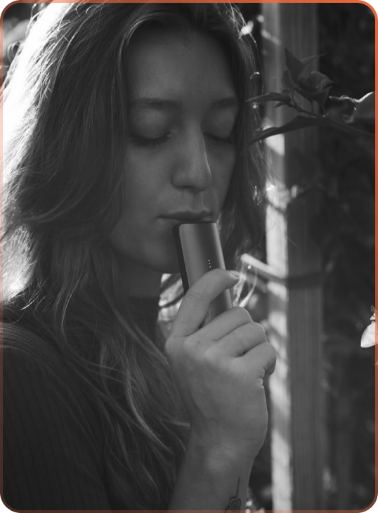 Person using DaVinci vaporizer